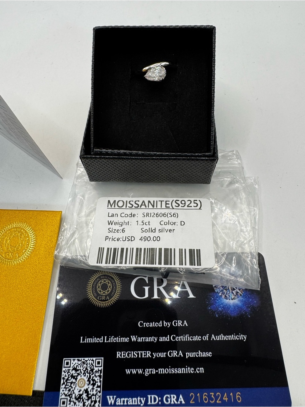 Moissanite Pear Halo Ring in Silver (White)